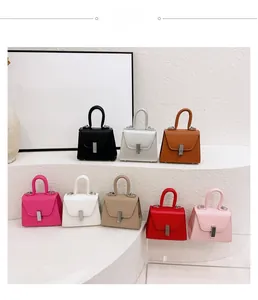 Minimalist mini trapezoid shoulder bags in eight assorted colors with silver metal buckles