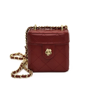 Deep red quilted mini box crossbody bag for kids with golden camellia clasp and chain