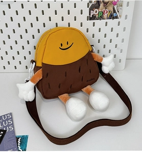 Detail view of cartoon plush crossbody bag with sweet smile embroidery and padded limbs