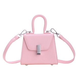 Pink lychee textured mini crossbody bag for kids with silver buckle and top handle