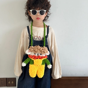 Handmade crochet cartoon doll crossbody bag for kids with colorful knit design and strap