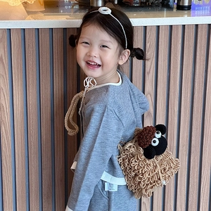 Cute crochet lamb shoulder bag for kids featuring handmade knit texture and a brown sheep design