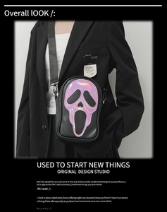 Detail of holographic ghost face pattern on matte black leather crossbody bag
