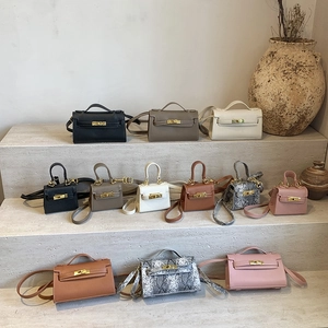 Mini Sac À Bandoulière Pour Enfants Mode Sac À Main En Cuir PU Avec Fermoir Rotatif En Métal Poignée Accessoire Élégant