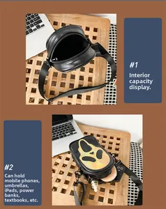 Internal storage view of black Scream Ghostface crossbody bag with laser holographic mask