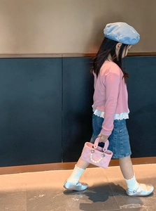 Pink quilted crossbody bag for girls featuring elegant pearl chain and double handles