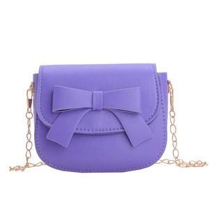 Chic purple mini bow crossbody bag for girls with gold chain strap on white background