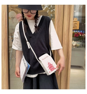 Creative white takeaway box crossbody bag featuring red Thank You print and tower design