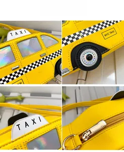 Detail view of yellow taxi-shaped PU leather crossbody bag with metallic zipper and NYC logo