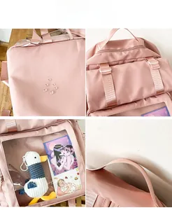 Close-up of waterproof nylon pink backpack details with transparent display window