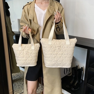 Quilted cream tote bag set with heart patterns in large and small sizes