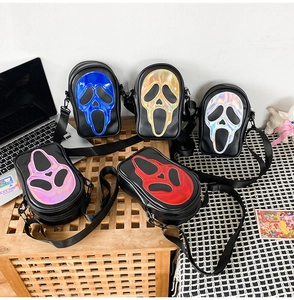 Ghostface crossbody bags featuring holographic masks in blue, gold, silver, pink and red