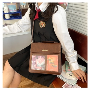 Brown vintage messenger bag with transparent card slot and elegant metallic logo detail