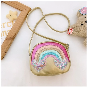 Detail of gold kids crossbody bag with rainbow sequins and heart-shaped glitter patches