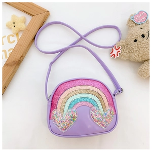 Detail of cute purple kids crossbody bag featuring glittery rainbow and heart sequins