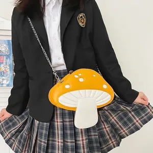Cute mushroom-shaped crossbody bag with yellow dots and silver chain strap for women