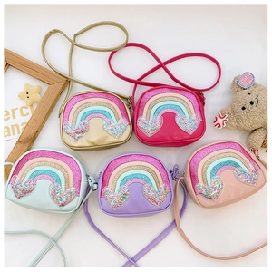 Detailed view of children's rainbow sequin crossbody bags in five assorted colors
