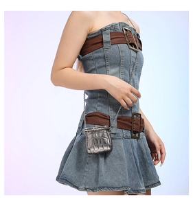 Detail of silver-grey crocodile pattern mini crossbody bag with metal chain strap