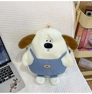 Detail view of cute plush dog backpack with blue overalls on a white textured sofa