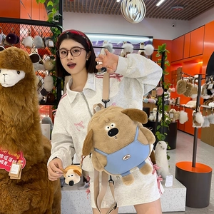 Cute brown plush dog backpack with blue overalls and matching coin purse charm