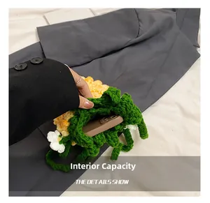Internal capacity of pineapple crochet bucket bag showing space for a smartphone