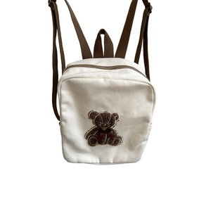 Cute bear canvas backpack for toddlers with adjustable straps in cream and brown