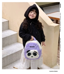 Detail of purple plush panda backpack for kids featuring a soft furry texture and fashion logo