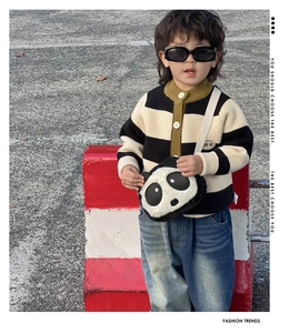 Cute panda plush crossbody bag styled with a striped cardigan and sunglasses for kids