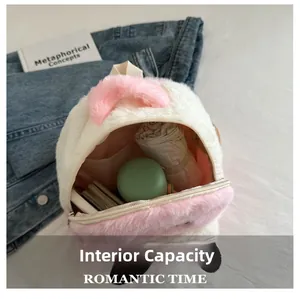 Internal capacity of panda plush toddler backpack showing water bottle and umbrella