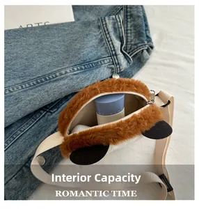 Internal capacity of brown plush panda shoulder bag showing storage for small daily items