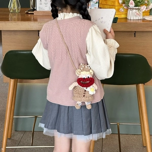 Handmade crochet cute character crossbody bag with pearl accents and brown knit strap
