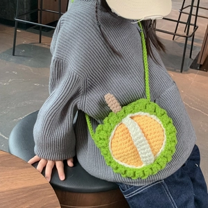 Handmade crochet durian crossbody bag for kids featuring green and yellow 3D knit patterns