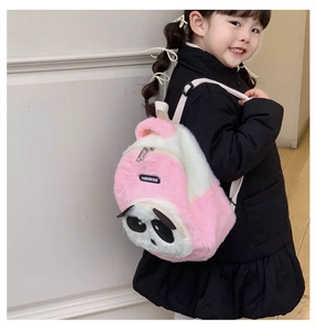 Detail of pink and white plush panda backpack featuring soft faux fur and adjustable straps