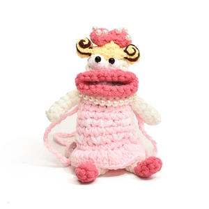 Pink handmade crochet sausage mouth doll crossbody bag with yellow hair and pearl necklace