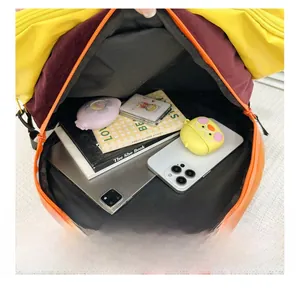 Interior view showing the large capacity of the colorful burger cartoon kids backpack