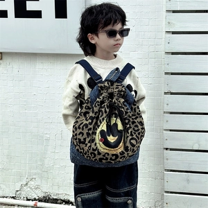 Sac à dos enfant léopard avec motif smiley de dessin animé et base en denim bleu
