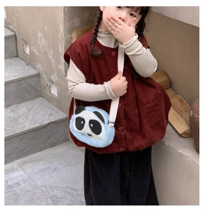Detail of cute panda plush crossbody bag showing the soft texture and blue-white design