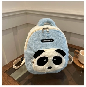 Close-up of soft blue and white plush panda backpack with a front zipper pocket