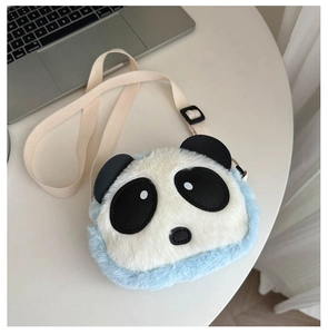 Detail view of the plush panda crossbody bag featuring soft blue fur and adjustable strap