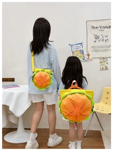 Creative hamburger-style kid's backpack and crossbody bag set in a cozy indoor scene