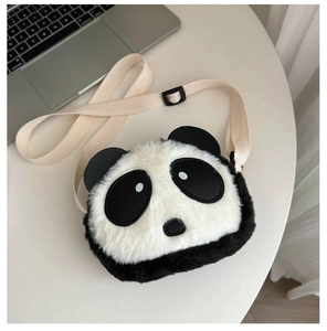 Detail of cute panda plush bag with soft faux fur texture and adjustable canvas strap