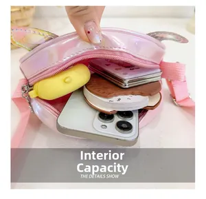 Detail showing internal capacity of holographic pink sequin crossbody bag for kids