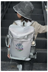 Silver-grey kids backpack with colorful hand logo and side mesh pockets for bottles