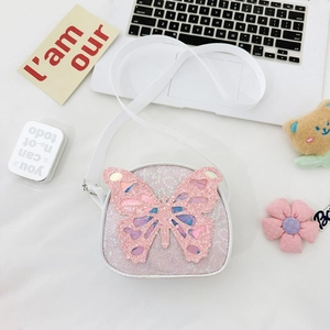 Detail of pink sequin butterfly crossbody bag for kids with white adjustable strap