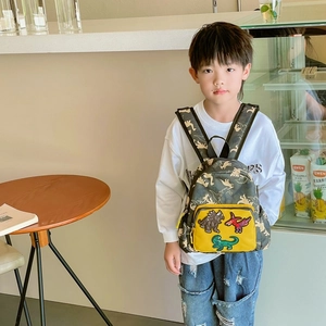 Zaino per bambini con dinosauri mimetici e tasca gialla con toppe per la scuola
