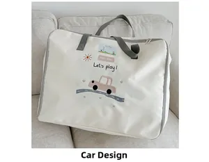 Detail of baby bedding storage bag featuring a cartoon car design and name card slot