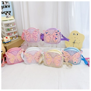 Detailed close-up of colorful butterfly sequin crossbody bags in six pastel color options