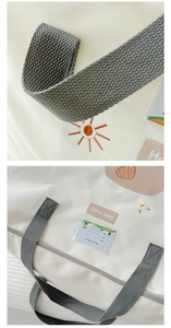 Detail of canvas quilt storage bag with cute sun embroidery and clear name card slot