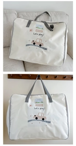 Detail of cartoon car bedding storage bag with transparent name slot and gray handles