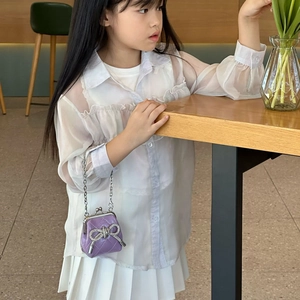Borsa a tracolla trapuntata lilla per bambina con fiocco di strass e chiusura oro